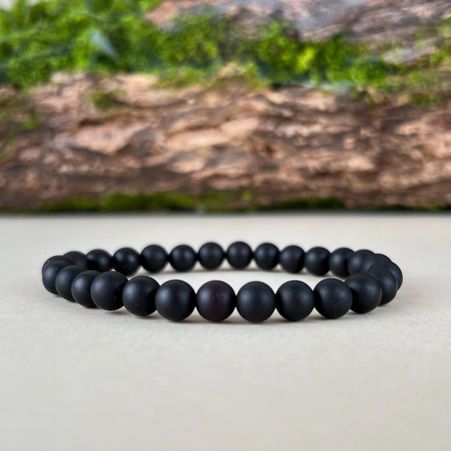 Deep Ground Matte black amber bracelet – 7mm beads