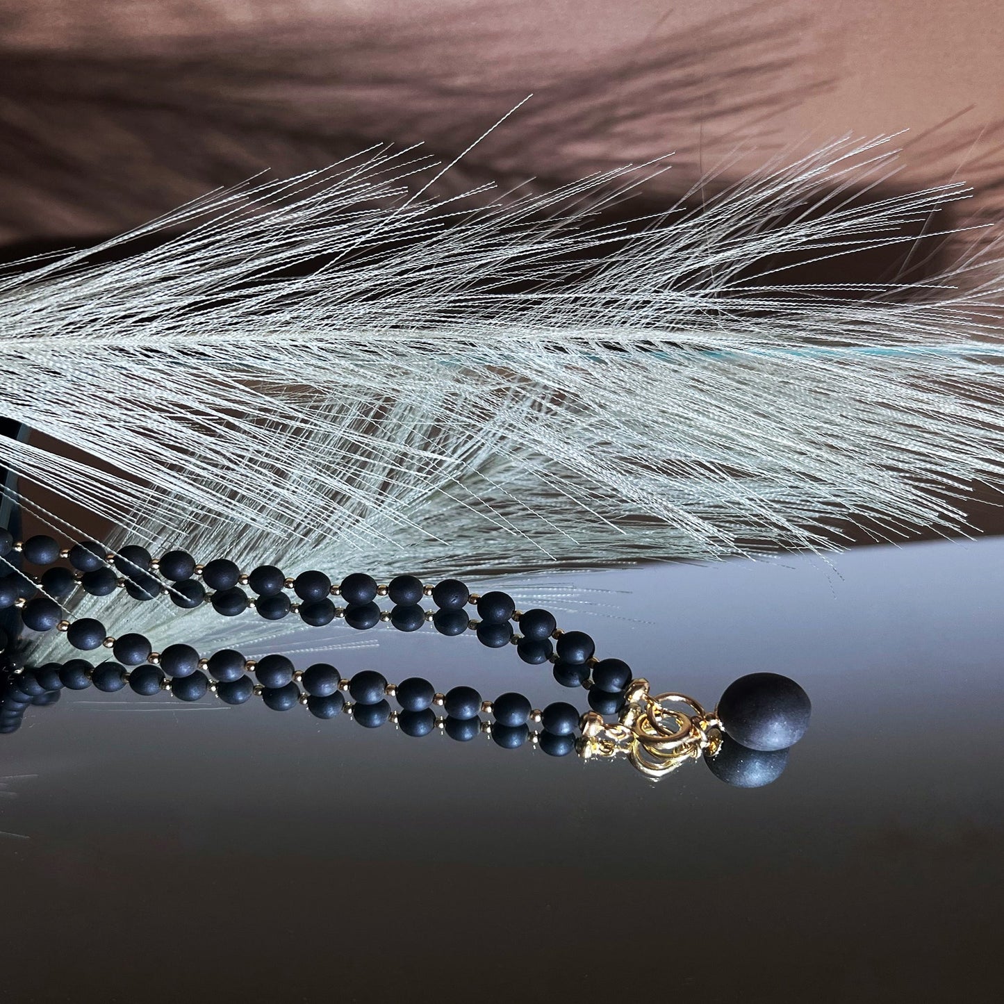 Black amber necklace "Bellum gold"