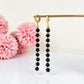 Silhouette Flow – Long Black Baltic Amber Earrings, 18K gold-plated