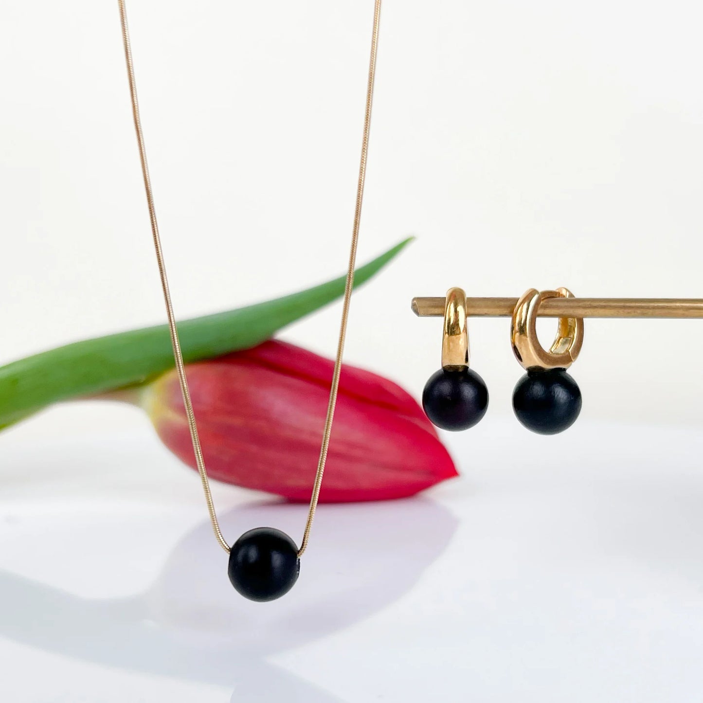 Noir Mini – Matte Black Baltic Amber Drop Earrings, 18K gold-plated huggie hoops