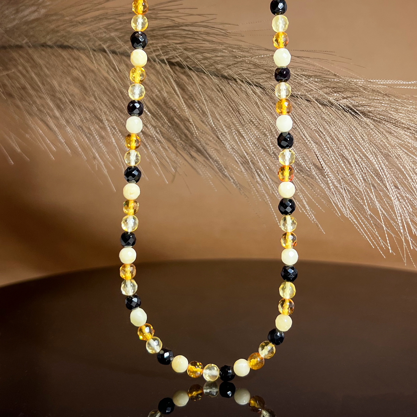 Faceted amber necklace "Colored crystals"