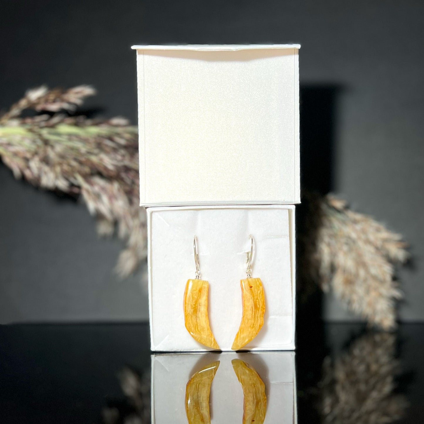Amber earrings, silver 925 "Little horns"