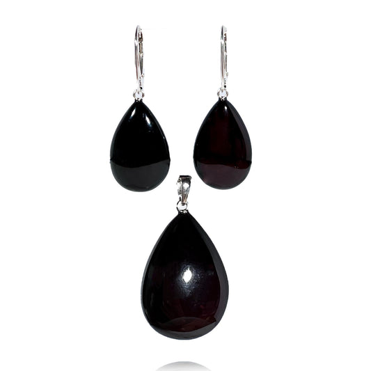 Black shiny amber set with silver 925 "Long night"
