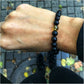 Black amber bracelet with clear amber insert "Consciousness"
