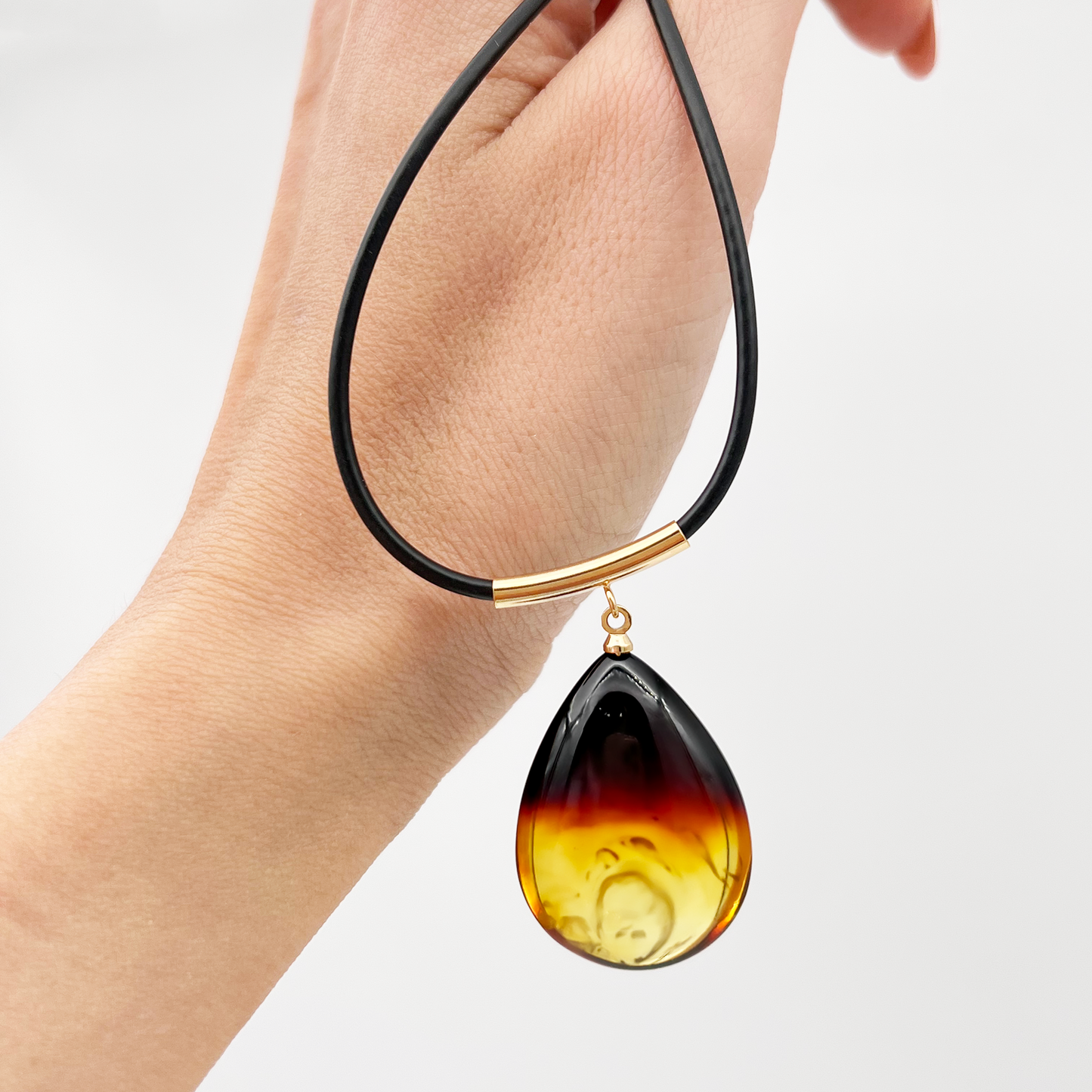 Amber pendant, gold plated "Deep red"